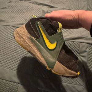 Nike Black and Olive Green Sneakers with Yellow Swoosh